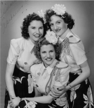 The "queens of the jukebox," the Andrews Sisters in 1943