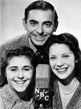 Dinah Shore's regular appearances with comedian Eddie Cantor on his weekly NBC comedy series helped to establish her popularity with audiences. Shore (far right) is pictured here with Cantor and 14-year-old classical soprano Olive Major, also a regular vocalist on the show